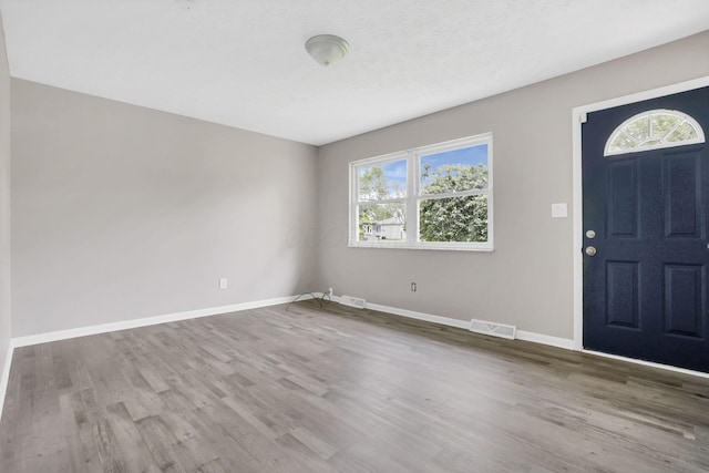 3197 E Ave, Columbus, OH 43207 - entryway with wood finished floors and baseboards