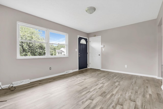 3197 E Ave, Columbus, OH 43207 - foyer with light wood-style floors and baseboards