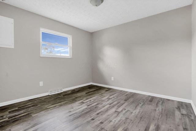 3197 E Ave, Columbus, OH 43207 - empty room featuring baseboards and wood finished floors