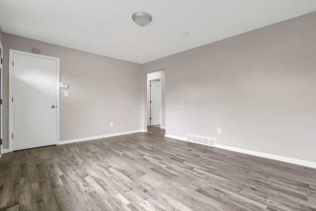 3197 E Ave, Columbus, OH 43207 - unfurnished room featuring wood finished floors and baseboards