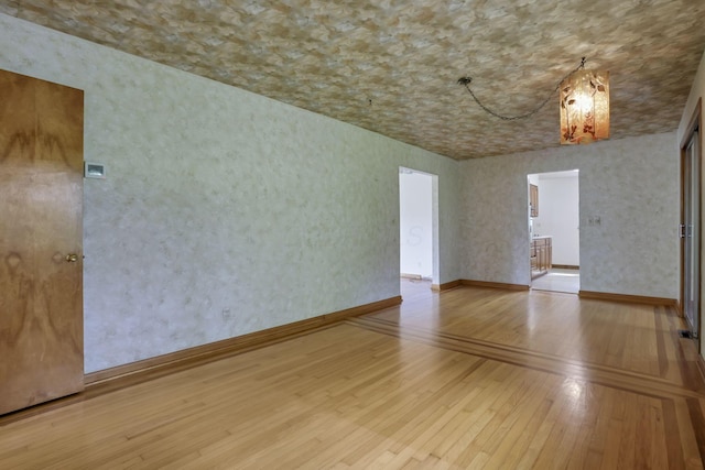 4648 E Johnstown Rd, Columbus, OH 43230 - unfurnished room featuring hardwood / wood-style floors and baseboards