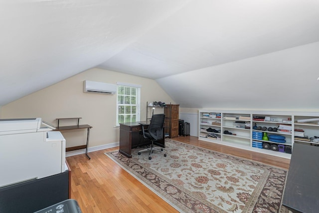 366 W S St, Worthington, OH 43085 - office featuring a wall mounted AC, wood finished floors, and vaulted ceiling