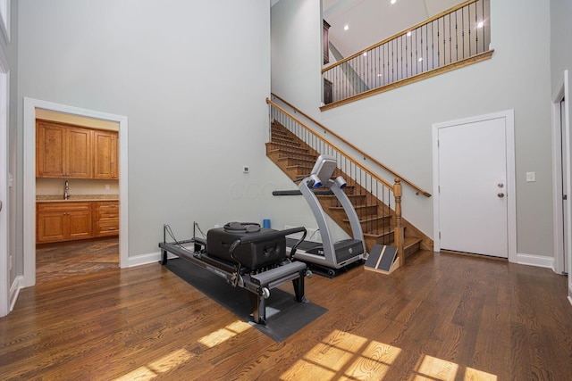 366 W S St, Worthington, OH 43085 - foyer entrance featuring a high ceiling, stairs, and dark wood finished floors