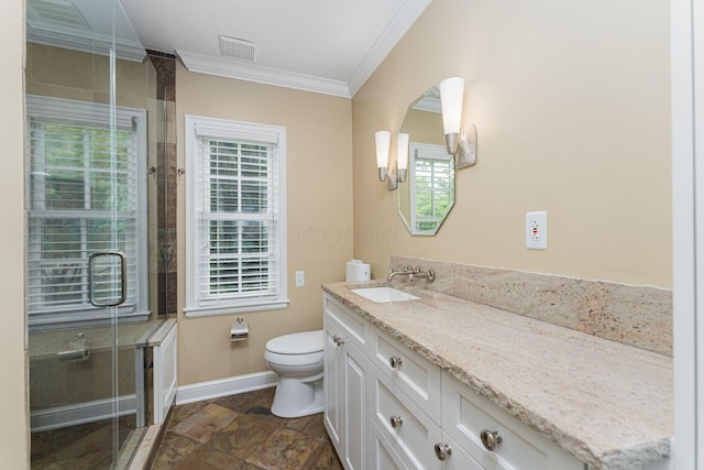 366 W S St, Worthington, OH 43085 - bathroom featuring ornamental molding, vanity, plenty of natural light, an enclosed shower, and stone finish floors