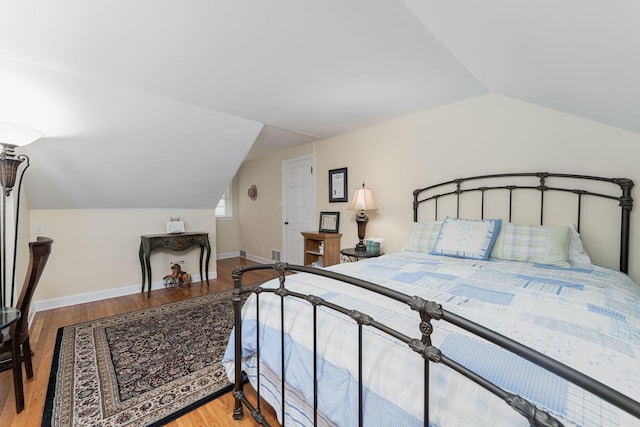366 W S St, Worthington, OH 43085 - bedroom with lofted ceiling and wood finished floors