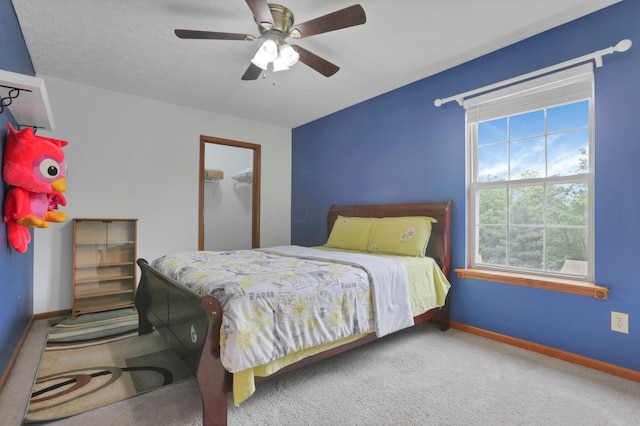 4966 Brice Creek Dr, Canal Winchester, OH 43110 - carpeted bedroom with baseboards and a ceiling fan