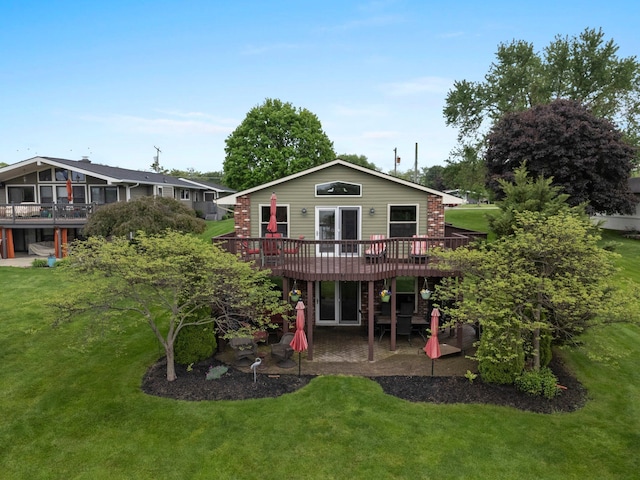 1244 E Choctaw Dr, London, OH 43140 - rear view of house with a wooden deck, a lawn, and a patio