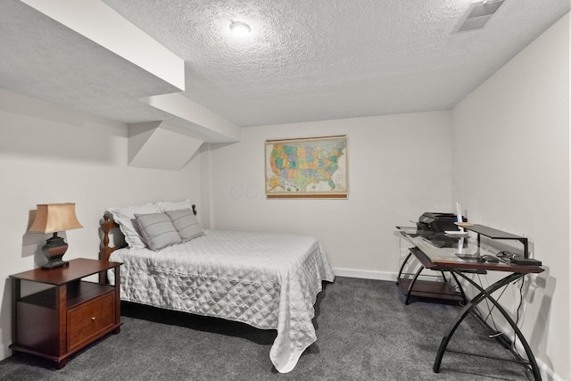 1244 E Choctaw Dr, London, OH 43140 - bedroom with dark carpet, a textured ceiling, and baseboards