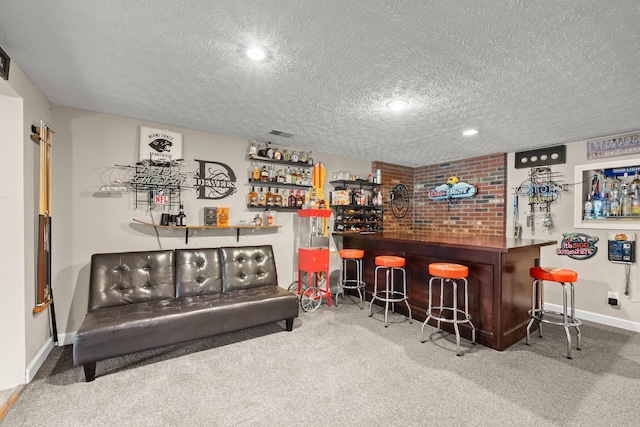 1244 E Choctaw Dr, London, OH 43140 - indoor dry bar featuring a textured ceiling, carpet floors, baseboards, and recessed lighting