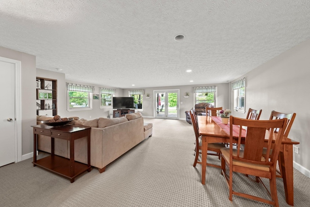 1244 E Choctaw Dr, London, OH 43140 - dining room with a textured ceiling, light colored carpet, plenty of natural light, and recessed lighting