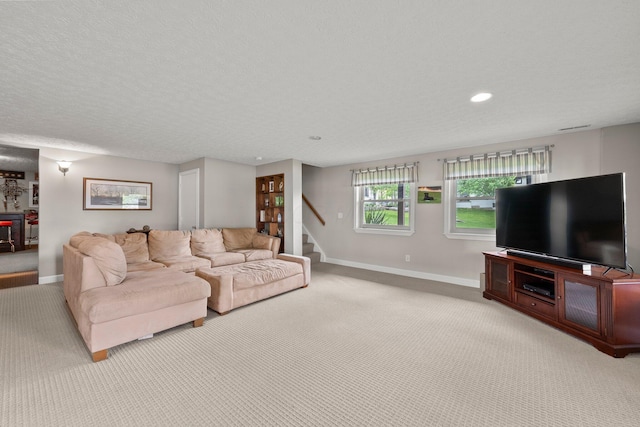 1244 E Choctaw Dr, London, OH 43140 - living room with carpet flooring, baseboards, stairway, and recessed lighting