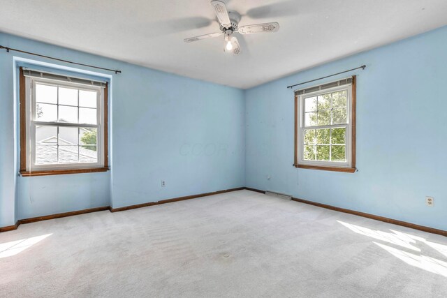 1541 Kensington Ln, Lancaster, OH 43130 - unfurnished room with carpet, baseboards, and a ceiling fan