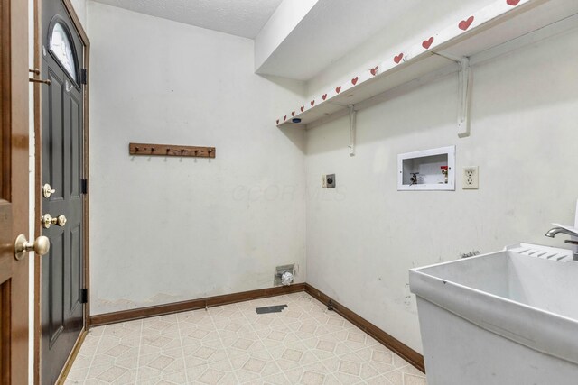 1541 Kensington Ln, Lancaster, OH 43130 - washroom featuring hookup for an electric dryer, washer hookup, and baseboards