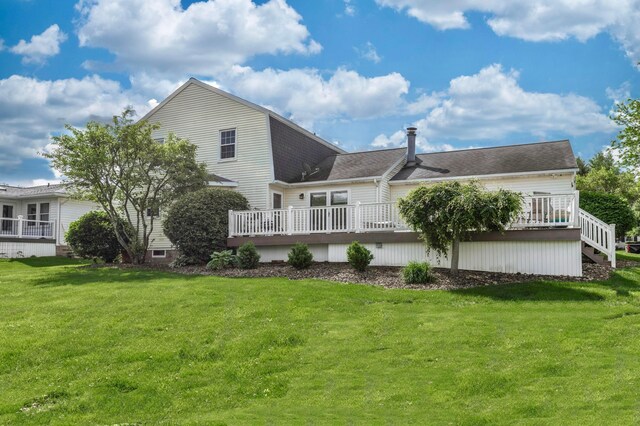 1541 Kensington Ln, Lancaster, OH 43130 - rear view of house featuring a deck, a yard, and a shingled roof