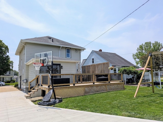 841 E Mulberry St, Lancaster, OH 43130 - rear view of house featuring a deck and a lawn