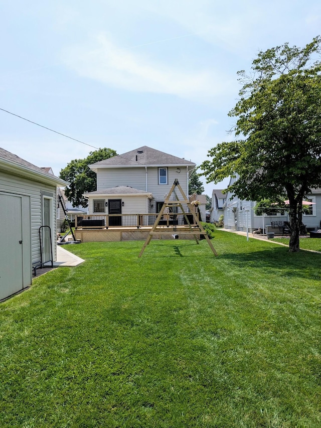 841 E Mulberry St, Lancaster, OH 43130 - rear view of house with a yard, a playground, and a deck