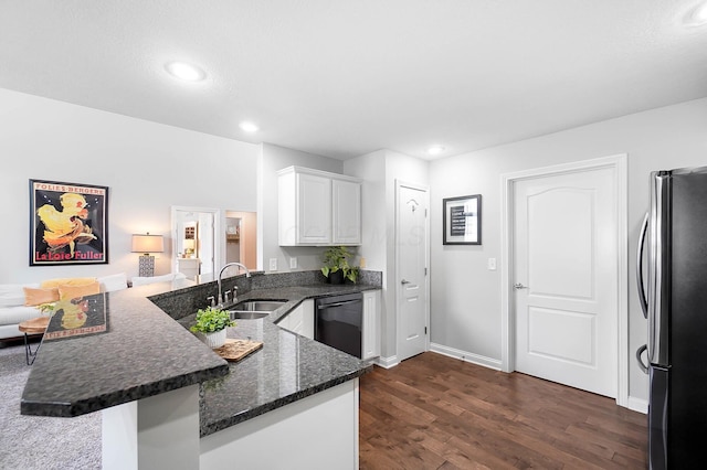 4481 Newport Loop E, Grove City, OH 43123 - kitchen featuring freestanding refrigerator, a sink, black dishwasher, a peninsula, and white cabinetry