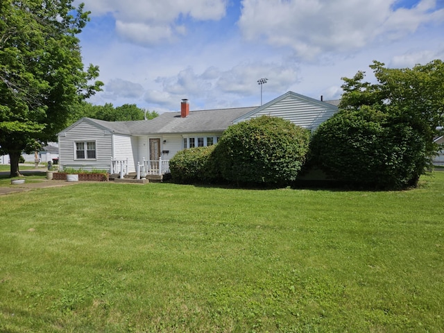 36 Johnson Rd, The Plains, OH 45780 - view of front of property featuring a front lawn and a chimney