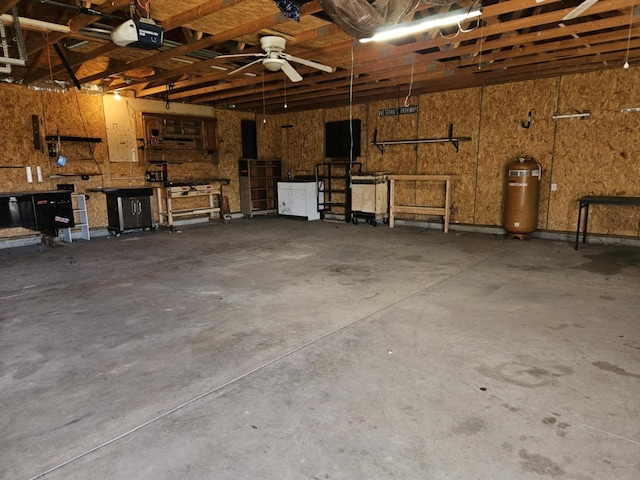 36 Johnson Rd, The Plains, OH 45780 - garage with a workshop area, a garage door opener, and ceiling fan