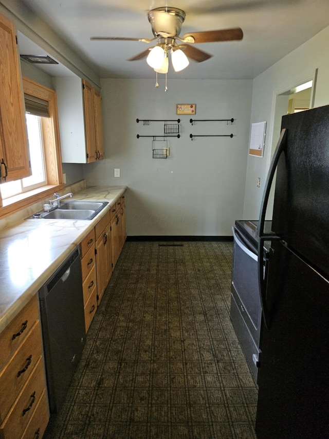 36 Johnson Rd, The Plains, OH 45780 - kitchen with freestanding refrigerator, dishwashing machine, range with electric cooktop, a sink, and a ceiling fan