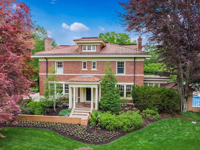 140 N Parkview Ave, Bexley, OH 43209 - view of front of property featuring a chimney, a tile roof, and a front lawn