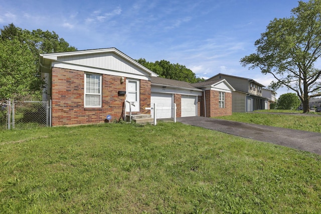 1950-1952 Bairsford Dr, Columbus, OH 43232 - ranch-style home with brick siding, a garage, asphalt driveway, and board and batten siding