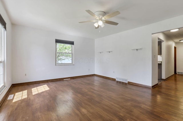 1950-1952 Bairsford Dr, Columbus, OH 43232 - empty room with a ceiling fan, wood finished floors, and baseboards