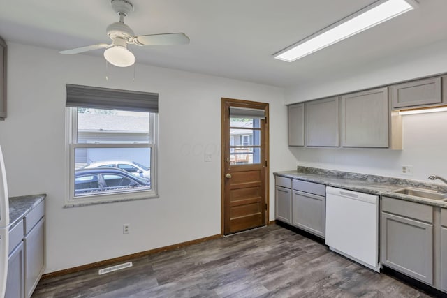 1950-1952 Bairsford Dr, Columbus, OH 43232 - kitchen featuring dishwasher, gray cabinets, healthy amount of natural light, and a sink