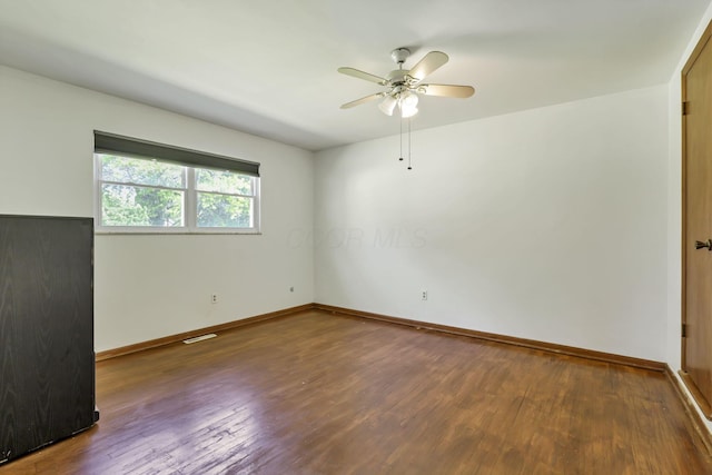 1950-1952 Bairsford Dr, Columbus, OH 43232 - empty room with wood finished floors, a ceiling fan, and baseboards