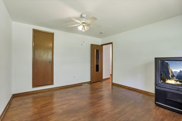 1950-1952 Bairsford Dr, Columbus, OH 43232 - unfurnished living room with wood finished floors, ceiling fan, and baseboards