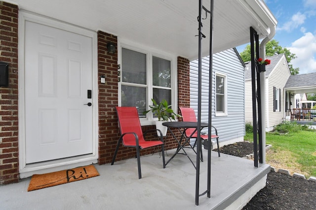 523 S Napoleon Ave, Columbus, OH 43213 - entrance to property with covered porch and brick siding
