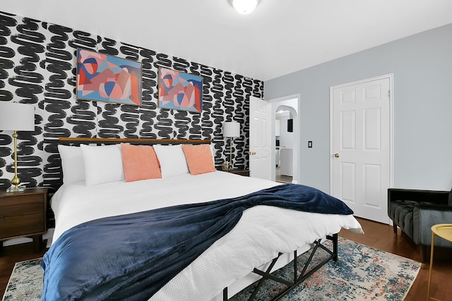 523 S Napoleon Ave, Columbus, OH 43213 - bedroom with wood finished floors and arched walkways