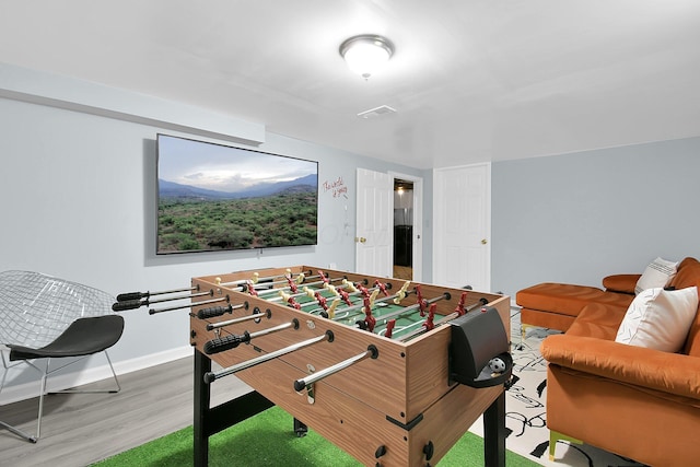 523 S Napoleon Ave, Columbus, OH 43213 - recreation room with wood finished floors and baseboards
