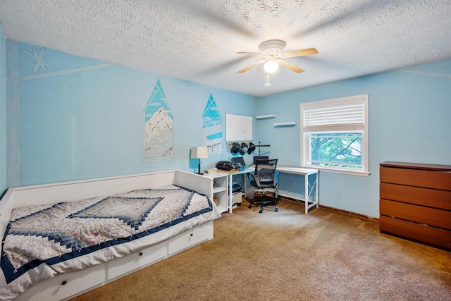 214 Sylvan Dr, Delaware, OH 43015 - carpeted bedroom featuring a textured ceiling, an office area, baseboards, and ceiling fan