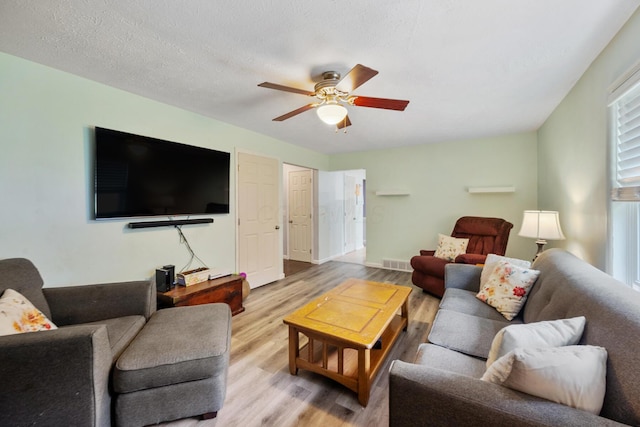214 Sylvan Dr, Delaware, OH 43015 - living room featuring a ceiling fan and light wood-style flooring
