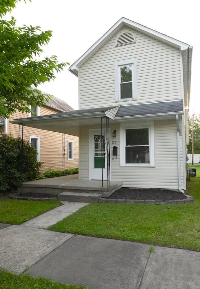723 N Maple St, Lancaster, OH 43130 - view of front of home with covered porch and a front yard