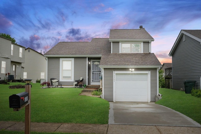 5309 Trillium Ct, Columbus, OH 43230 - split level home with a lawn, a garage, concrete driveway, roof with shingles, and a chimney