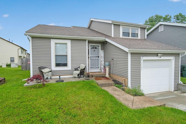 5309 Trillium Ct, Columbus, OH 43230 - split level home with a front lawn, an attached garage, and a shingled roof