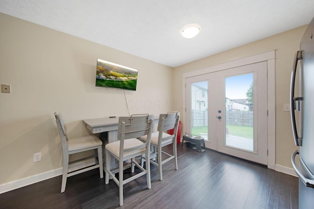 5309 Trillium Ct, Columbus, OH 43230 - dining space featuring french doors, dark wood finished floors, and baseboards