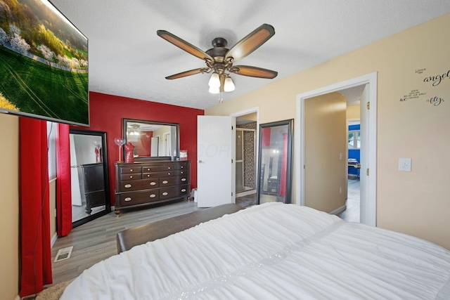 5309 Trillium Ct, Columbus, OH 43230 - bedroom with wood finished floors and ceiling fan