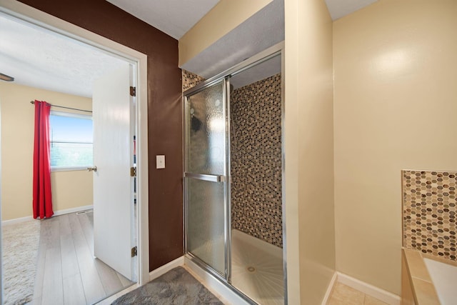 5309 Trillium Ct, Columbus, OH 43230 - full bathroom featuring a stall shower and baseboards