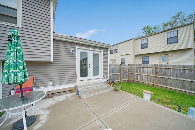 5309 Trillium Ct, Columbus, OH 43230 - fenced backyard featuring french doors and a patio area