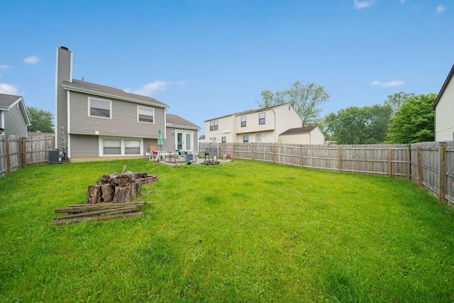 5309 Trillium Ct, Columbus, OH 43230 - view of yard with central AC, a fire pit, and a patio area
