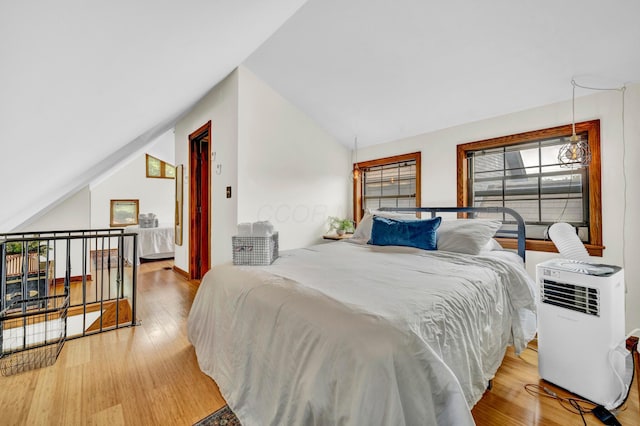 606 S 9th St, Columbus, OH 43206 - bedroom featuring vaulted ceiling and wood finished floors