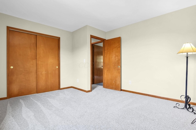 255 Oakview Ct, Pickerington, OH 43147 - unfurnished bedroom with baseboards, carpet floors, and a closet