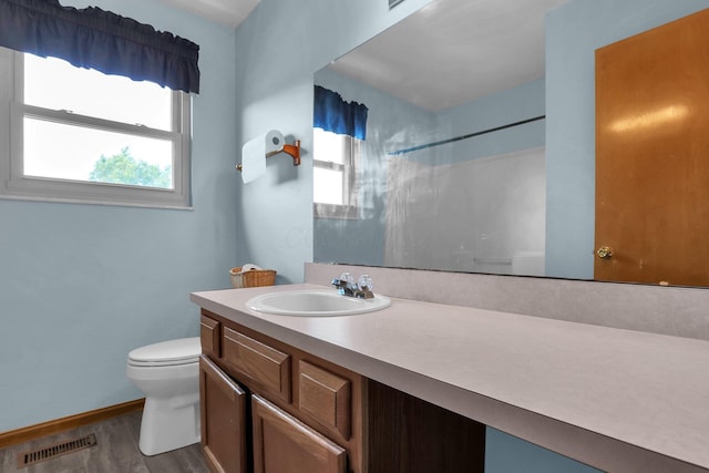 255 Oakview Ct, Pickerington, OH 43147 - full bath with toilet, vanity, a shower, wood finished floors, and baseboards