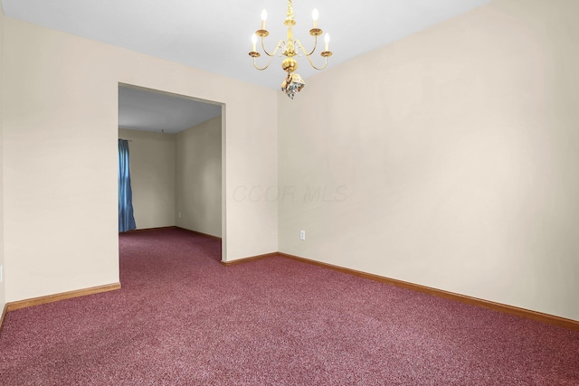 255 Oakview Ct, Pickerington, OH 43147 - spare room with dark carpet, a chandelier, and baseboards