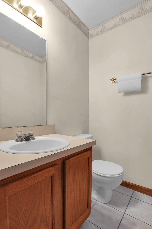255 Oakview Ct, Pickerington, OH 43147 - bathroom with vanity, toilet, tile patterned floors, and baseboards