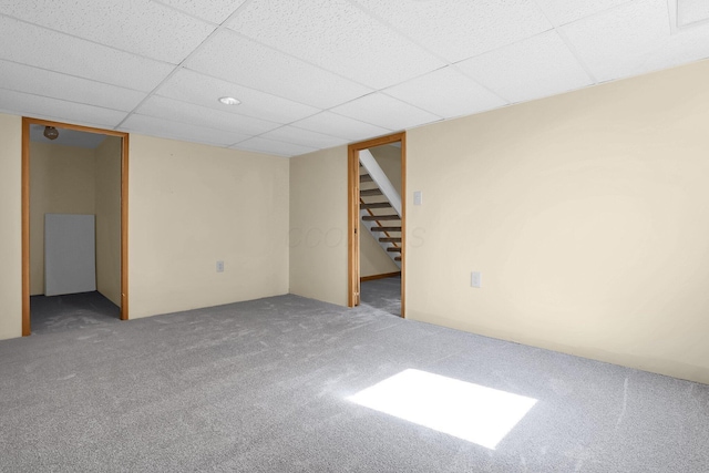 255 Oakview Ct, Pickerington, OH 43147 - carpeted empty room featuring stairs and a paneled ceiling