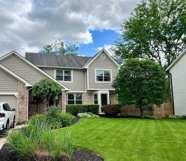 view of front of property with brick siding and an attached garage